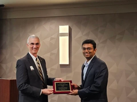 Sharan Srinivas receiving the 2024 Outstanding ISE Faculty Award