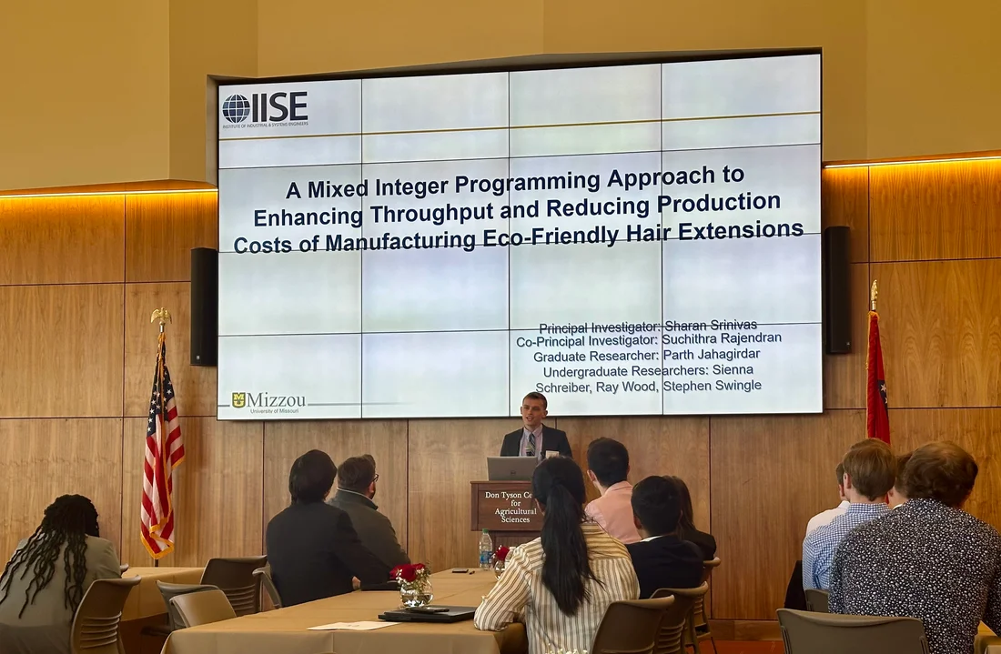 Ray Wood presenting a manufacturing optimization research project at an IISE regional conference